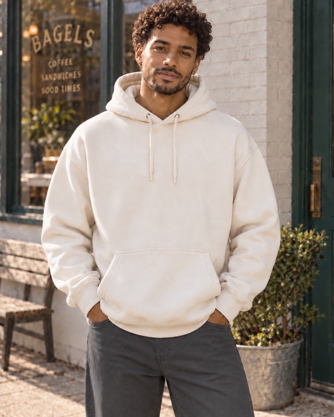 Front mockup of the cream Goldy hoodie with a clean, unbranded chest